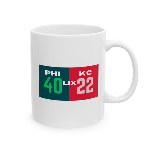White mug with sports-themed design featuring 'PHI 40 LIX' and 'KC 22' on a white background